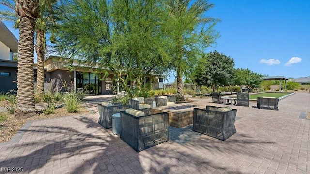 4200 E Brusca Way, Pahrump, NV 89061 - view of patio / terrace with a fire pit and a bocce ball area