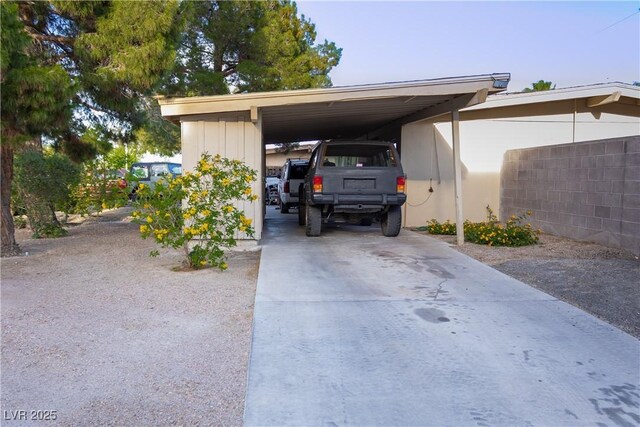 2001 E Mcwilliams Ave, Las Vegas, NV 89101 - view of parking with concrete driveway and a carport