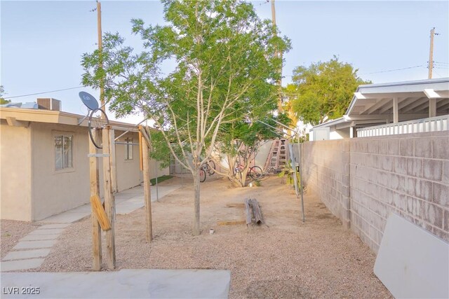 2001 E Mcwilliams Ave, Las Vegas, NV 89101 - fenced backyard with a patio