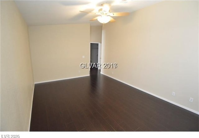 7518 Luna Del Rey St, Las Vegas, NV 89123 - spare room with a ceiling fan, dark wood-type flooring, and baseboards