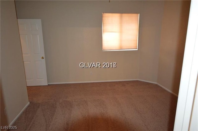 7518 Luna Del Rey St, Las Vegas, NV 89123 - unfurnished room with carpet flooring and baseboards