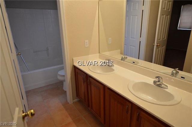 7518 Luna Del Rey St, Las Vegas, NV 89123 - bathroom with toilet, double vanity, and tile patterned floors