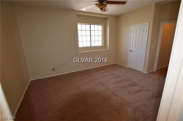 7518 Luna Del Rey St, Las Vegas, NV 89123 - empty room with ceiling fan, carpet, and baseboards