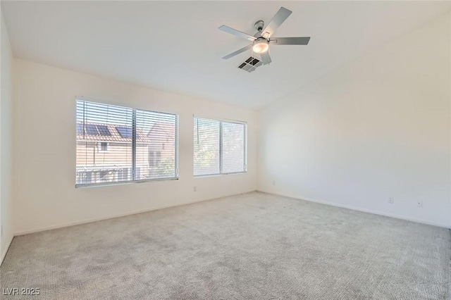 10241 Regents Cross Pl, Las Vegas, NV 89144 - spare room with carpet floors, lofted ceiling, ceiling fan, and baseboards