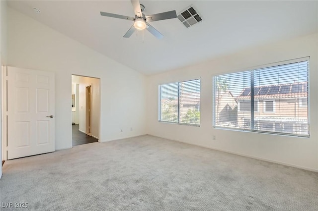 10241 Regents Cross Pl, Las Vegas, NV 89144 - unfurnished bedroom with carpet floors, lofted ceiling, baseboards, a ceiling fan, and connected bathroom
