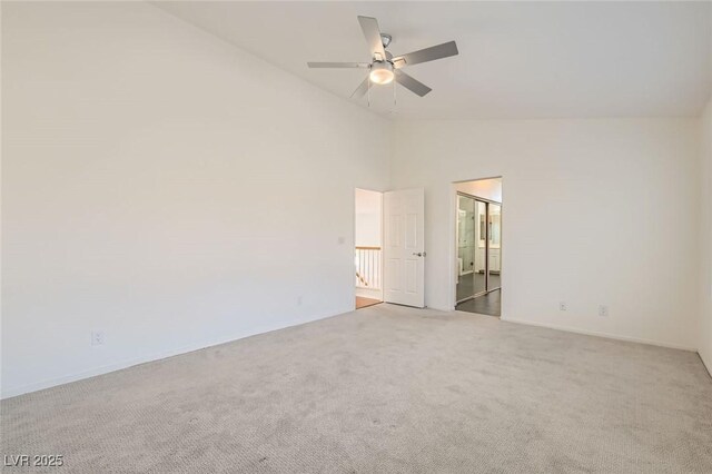 10241 Regents Cross Pl, Las Vegas, NV 89144 - empty room featuring vaulted ceiling, carpet, and a ceiling fan