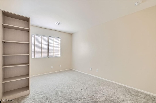 10241 Regents Cross Pl, Las Vegas, NV 89144 - unfurnished room with carpet, a smoke detector, and baseboards