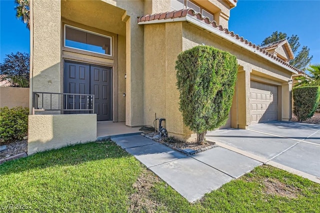 10241 Regents Cross Pl, Las Vegas, NV 89144 - doorway to property with stucco siding, driveway, a tile roof, and a garage