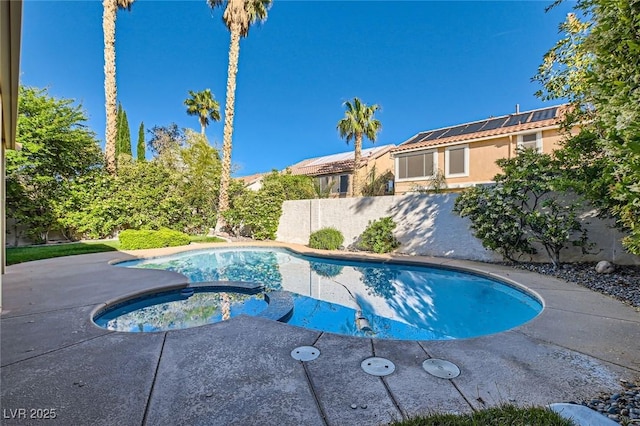 10241 Regents Cross Pl, Las Vegas, NV 89144 - view of swimming pool with a pool with connected hot tub, a fenced backyard, and a patio area