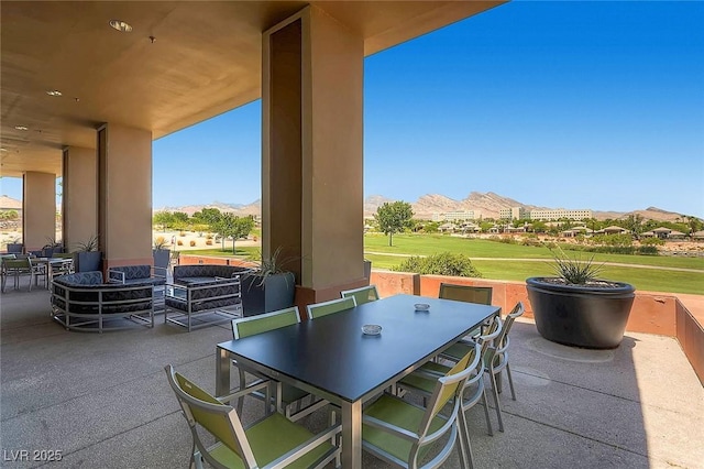 10241 Regents Cross Pl, Las Vegas, NV 89144 - view of patio featuring outdoor dining space and a mountain view