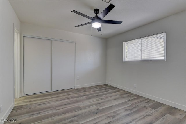 1901 Farnam Pl, Las Vegas, NV 89102 - unfurnished bedroom with wood finished floors, a closet, and baseboards