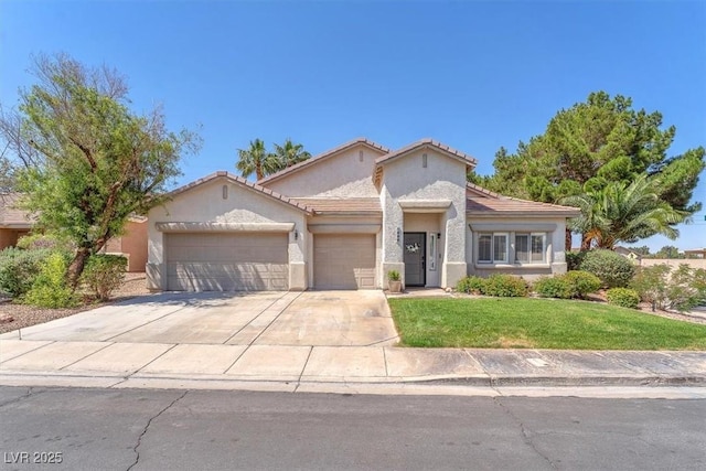 1088 Casady Hollow Ave, Henderson, NV 89012 - ranch-style home featuring a garage, a front lawn, stucco siding, concrete driveway, and a tile roof