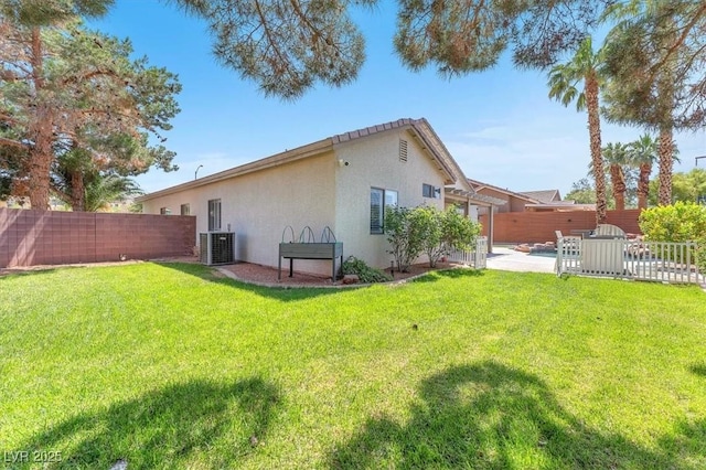 1088 Casady Hollow Ave, Henderson, NV 89012 - rear view of property with stucco siding, cooling unit, and a patio area