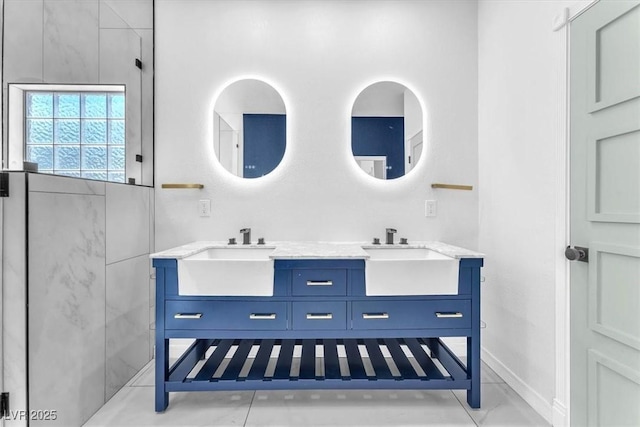 1088 Casady Hollow Ave, Henderson, NV 89012 - bathroom with double vanity and baseboards