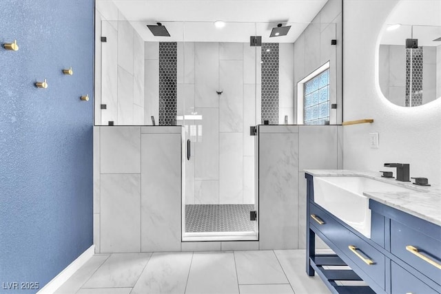 1088 Casady Hollow Ave, Henderson, NV 89012 - bathroom featuring a shower stall, vanity, and a textured wall