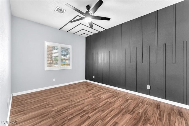1088 Casady Hollow Ave, Henderson, NV 89012 - unfurnished room with a ceiling fan, wood finished floors, and baseboards