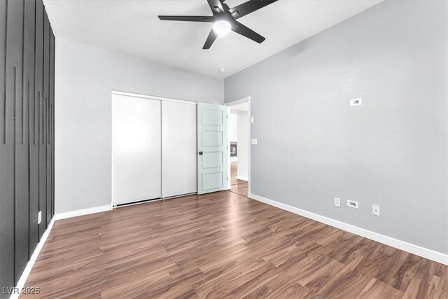 1088 Casady Hollow Ave, Henderson, NV 89012 - unfurnished bedroom featuring baseboards and wood finished floors
