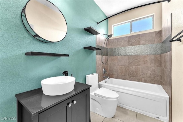 1088 Casady Hollow Ave, Henderson, NV 89012 - bathroom featuring a textured wall, tile patterned flooring, shower / bathtub combination, toilet, and vanity