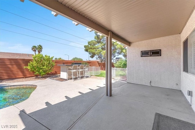 1088 Casady Hollow Ave, Henderson, NV 89012 - fenced backyard with a patio area