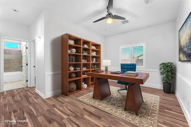1088 Casady Hollow Ave, Henderson, NV 89012 - office with a ceiling fan and wood finished floors