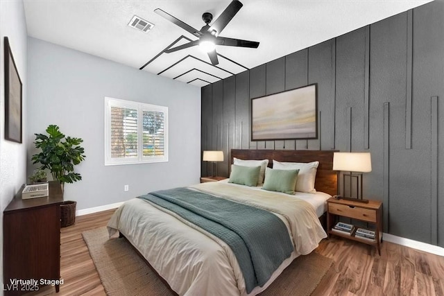 1088 Casady Hollow Ave, Henderson, NV 89012 - bedroom with light wood-type flooring, baseboards, and ceiling fan