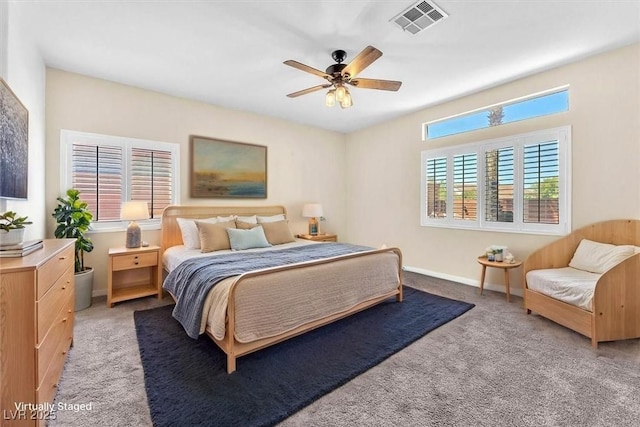 1088 Casady Hollow Ave, Henderson, NV 89012 - bedroom with baseboards, light carpet, and ceiling fan