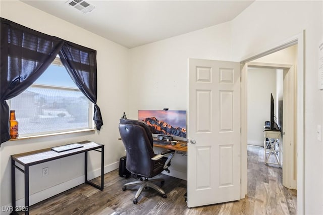 564 Lampshire Ln, Pahrump, NV 89060 - office space with wood finished floors, lofted ceiling, and baseboards