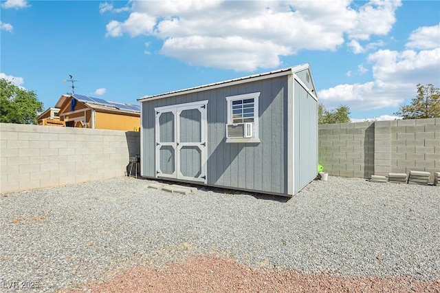 564 Lampshire Ln, Pahrump, NV 89060 - view of shed featuring a fenced backyard and cooling unit
