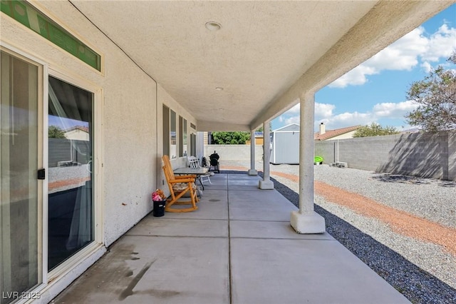 564 Lampshire Ln, Pahrump, NV 89060 - fenced backyard featuring a patio area