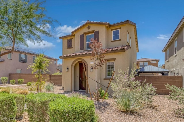 1130 Blissful Plains Ave, North Las Vegas, NV 89086 - mediterranean / spanish-style house with a tiled roof, stucco siding, and a gazebo