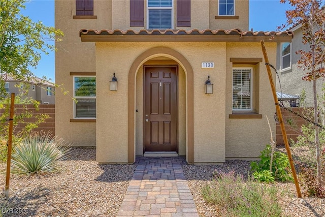 1130 Blissful Plains Ave, North Las Vegas, NV 89086 - doorway to property featuring stucco siding