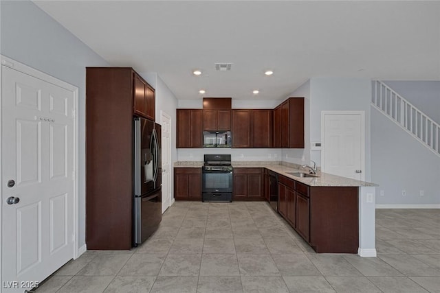 1130 Blissful Plains Ave, North Las Vegas, NV 89086 - kitchen with black appliances, a sink, light tile patterned flooring, light stone countertops, and a peninsula