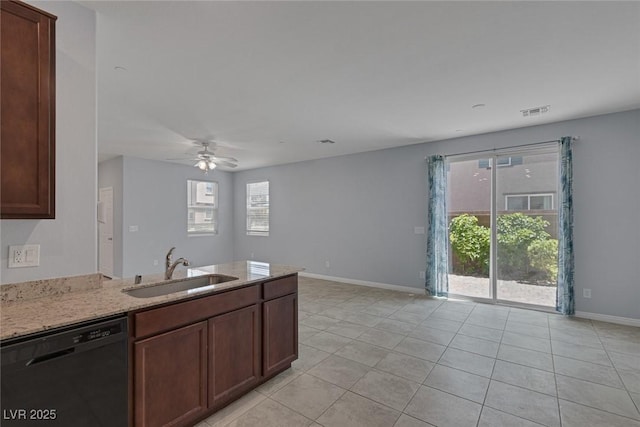 1130 Blissful Plains Ave, North Las Vegas, NV 89086 - kitchen with black dishwasher, a sink, baseboards, light tile patterned flooring, and ceiling fan