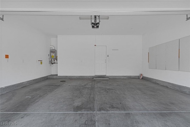 1130 Blissful Plains Ave, North Las Vegas, NV 89086 - garage featuring water heater and a garage door opener