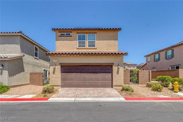 1130 Blissful Plains Ave, North Las Vegas, NV 89086 - mediterranean / spanish house featuring stucco siding, a garage, a gate, and a tiled roof