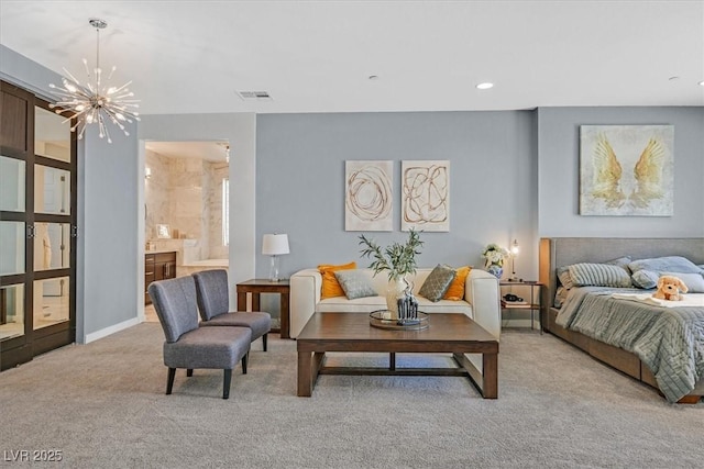 881 Barrhead Ave, Henderson, NV 89012 - carpeted bedroom featuring a chandelier, ensuite bathroom, and recessed lighting