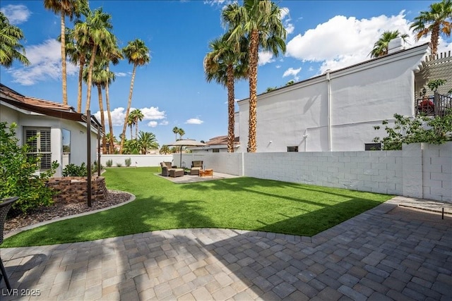 219 Windsong Dr, Henderson, NV 89074 - view of yard with a patio area and an outdoor living space