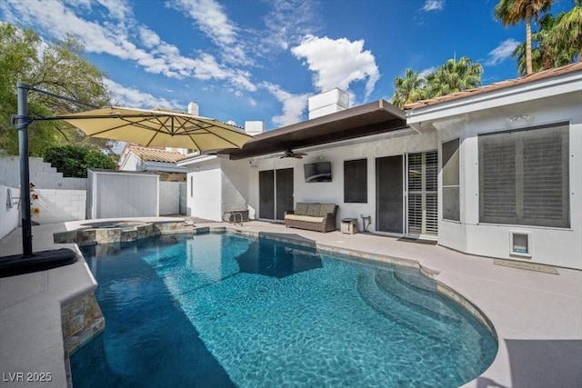 219 Windsong Dr, Henderson, NV 89074 - view of swimming pool featuring a ceiling fan, a patio area, and a pool with connected hot tub