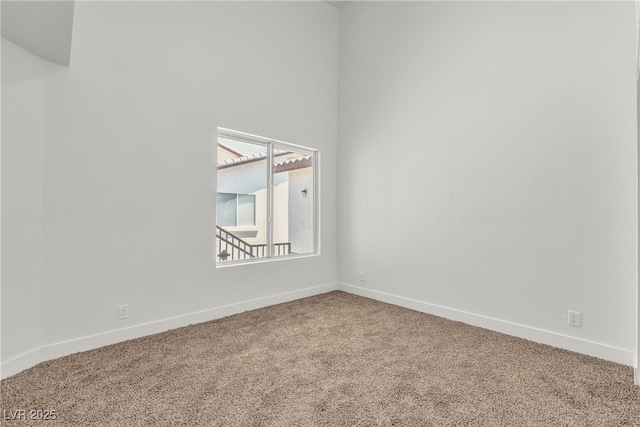 4800 Grey Wolf Ln Unit 202, Las Vegas, NV 89149 - carpeted empty room featuring baseboards