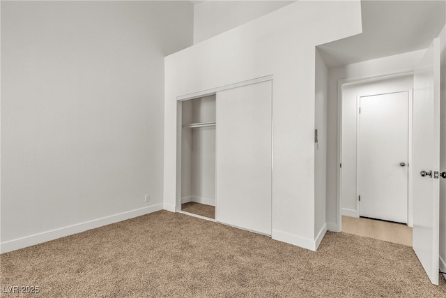 4800 Grey Wolf Ln Unit 202, Las Vegas, NV 89149 - unfurnished bedroom with carpet flooring and a closet