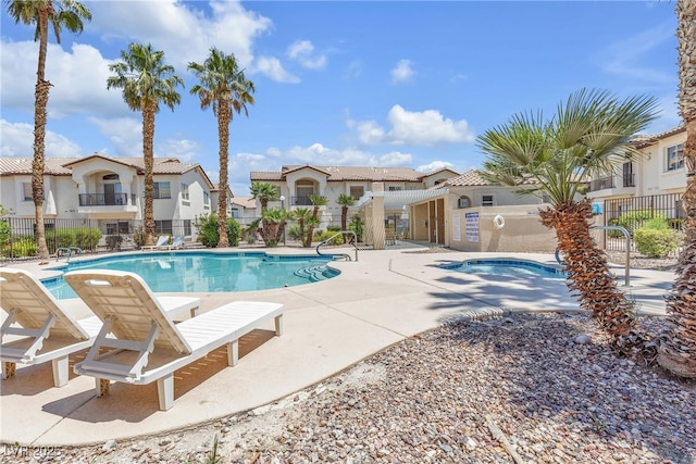 4800 Grey Wolf Ln Unit 202, Las Vegas, NV 89149 - community pool featuring a residential view, a patio, and a hot tub