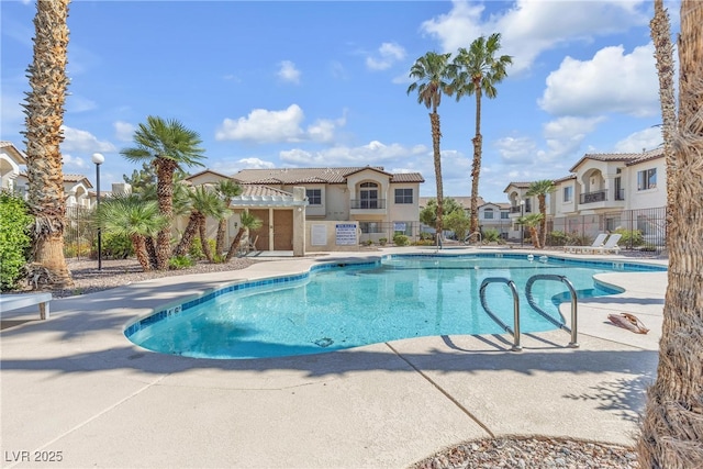 4800 Grey Wolf Ln Unit 202, Las Vegas, NV 89149 - community pool with a residential view and a patio