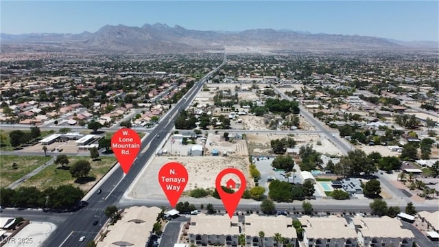 4800 Grey Wolf Ln Unit 202, Las Vegas, NV 89149 - aerial view of property and surrounding area featuring mountains and nearby suburban area