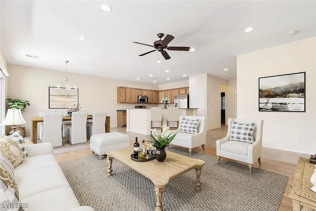 2538 Capella Star St, Henderson, NV 89044 - living room with ceiling fan, recessed lighting, light wood-type flooring, and baseboards