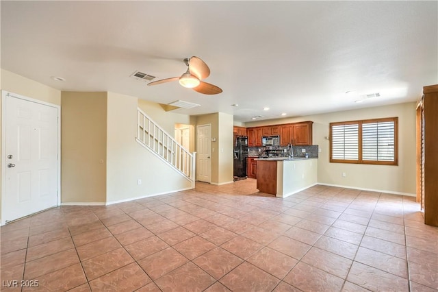9073 Spoonbill Ridge Pl, Las Vegas, NV 89143 - unfurnished living room with light tile patterned floors, stairs, recessed lighting, a ceiling fan, and baseboards