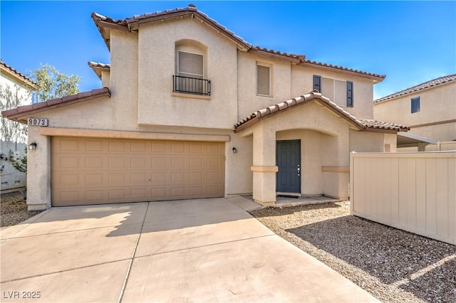 9073 Spoonbill Ridge Pl, Las Vegas, NV 89143 - mediterranean / spanish house featuring a tile roof, stucco siding, driveway, and a garage
