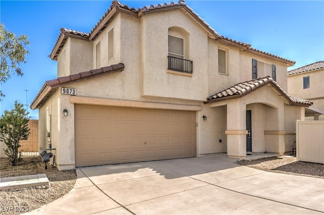 9073 Spoonbill Ridge Pl, Las Vegas, NV 89143 - mediterranean / spanish-style house featuring a tiled roof, a garage, and stucco siding