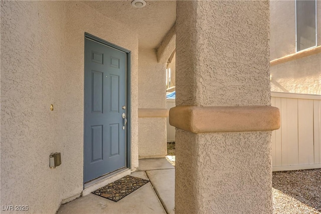 9073 Spoonbill Ridge Pl, Las Vegas, NV 89143 - entrance to property with stucco siding