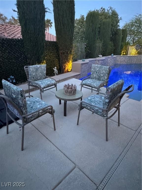 4208 Agosta Luna Pl, Las Vegas, NV 89135 - view of patio with outdoor lounge area and an outdoor pool