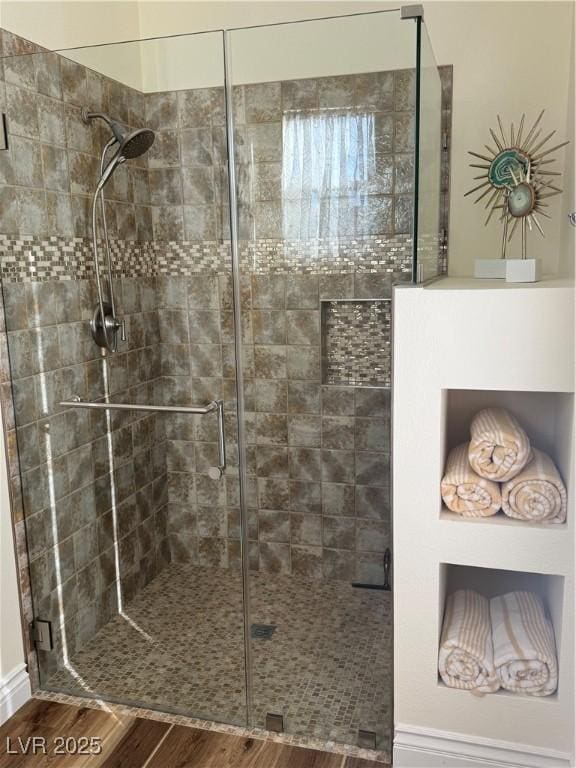 4208 Agosta Luna Pl, Las Vegas, NV 89135 - bathroom featuring a shower stall and wood finished floors